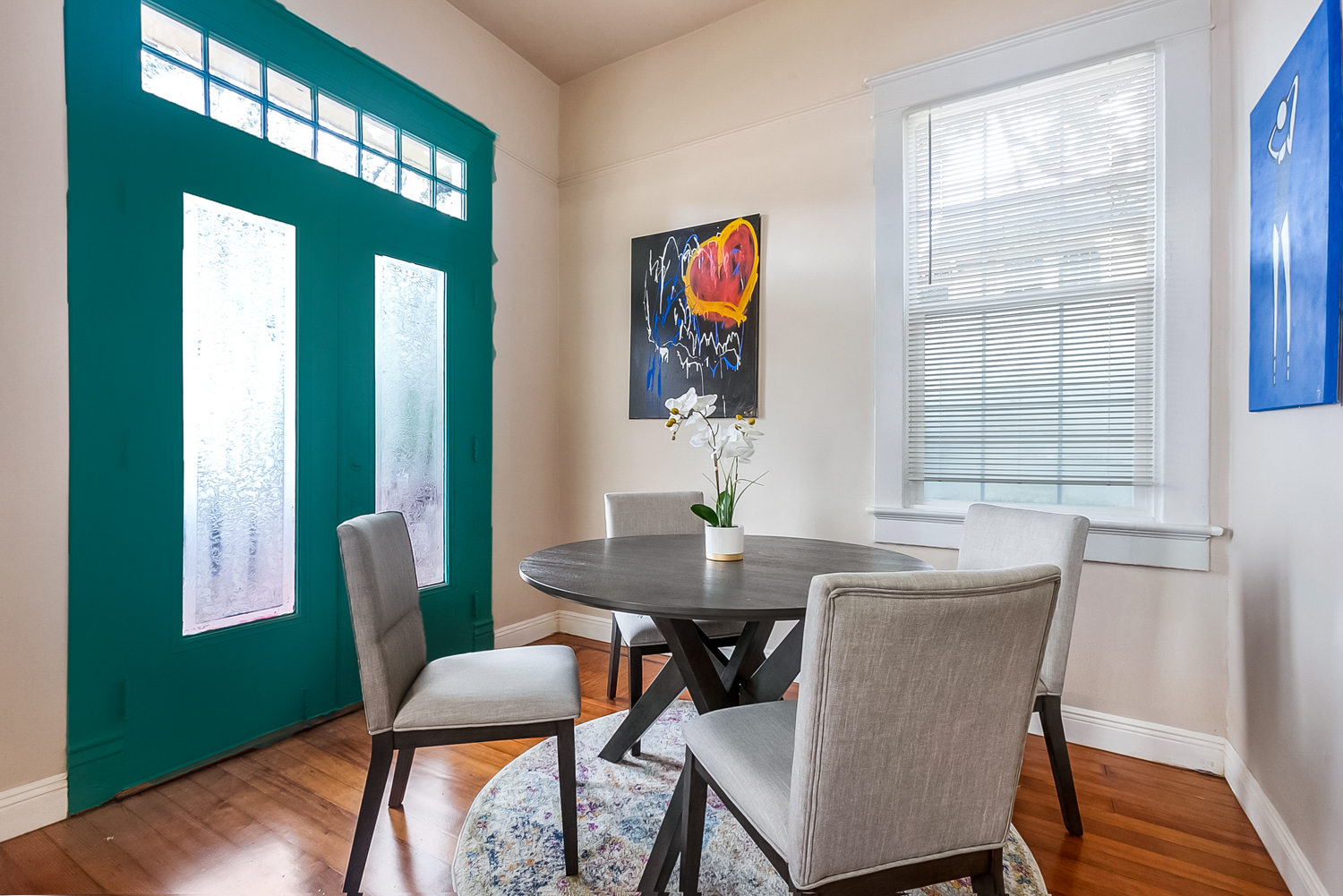 Dining area with teal entry